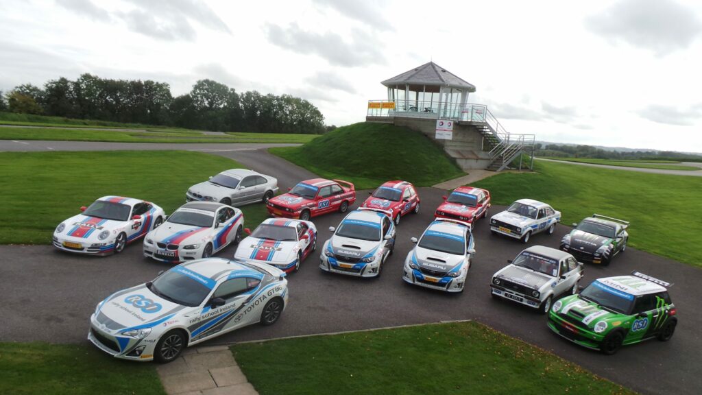 Fleet of cars in front of the tower