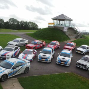 Fleet of cars in front of the tower