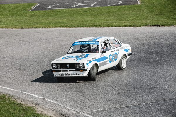 Mark II Ford Escort on dry track with customer driving